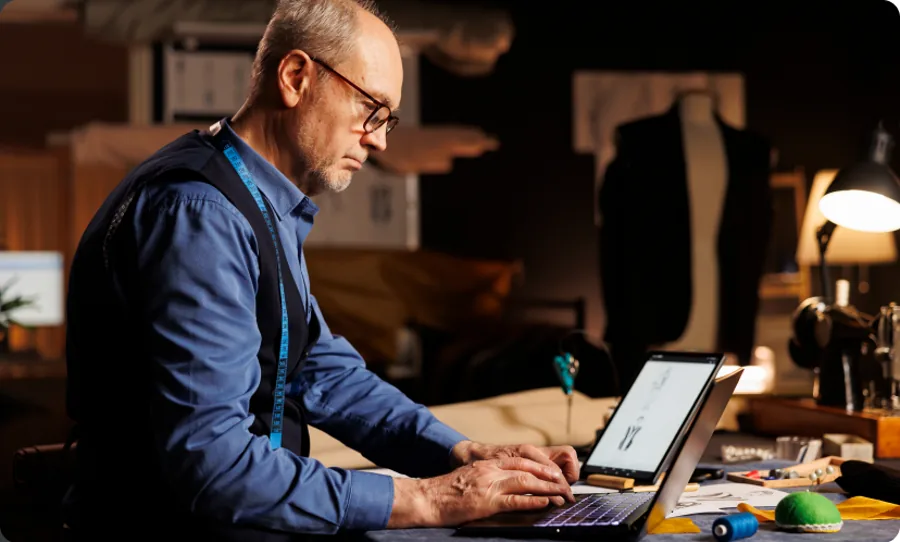Founder creating content on a laptop