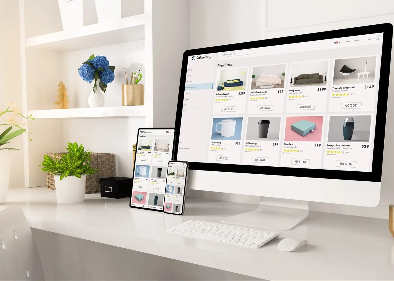 An ecommerce storefront shown across desktop, tablet and mobile on a workspace