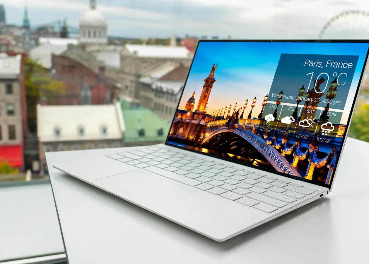 A product interface open on a laptop at a bright desk