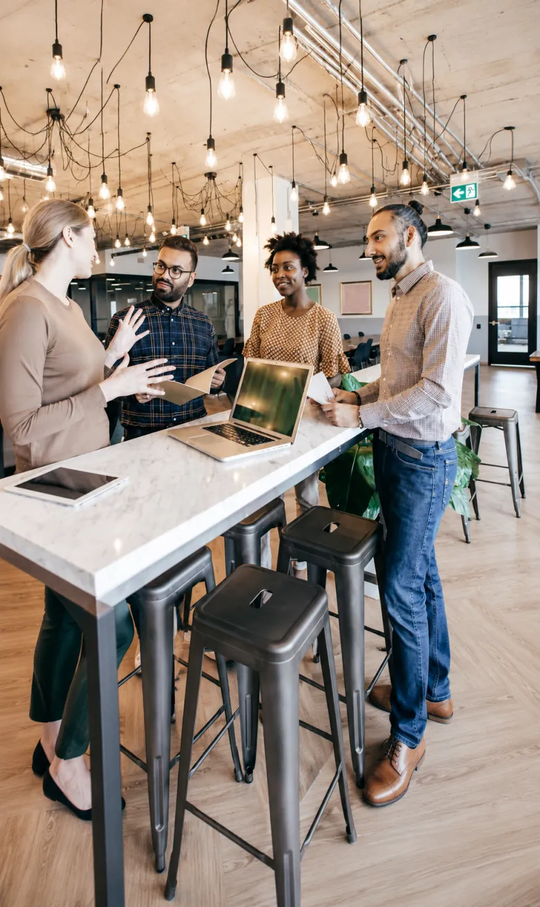 Retail technology team collaborating in a modern store space