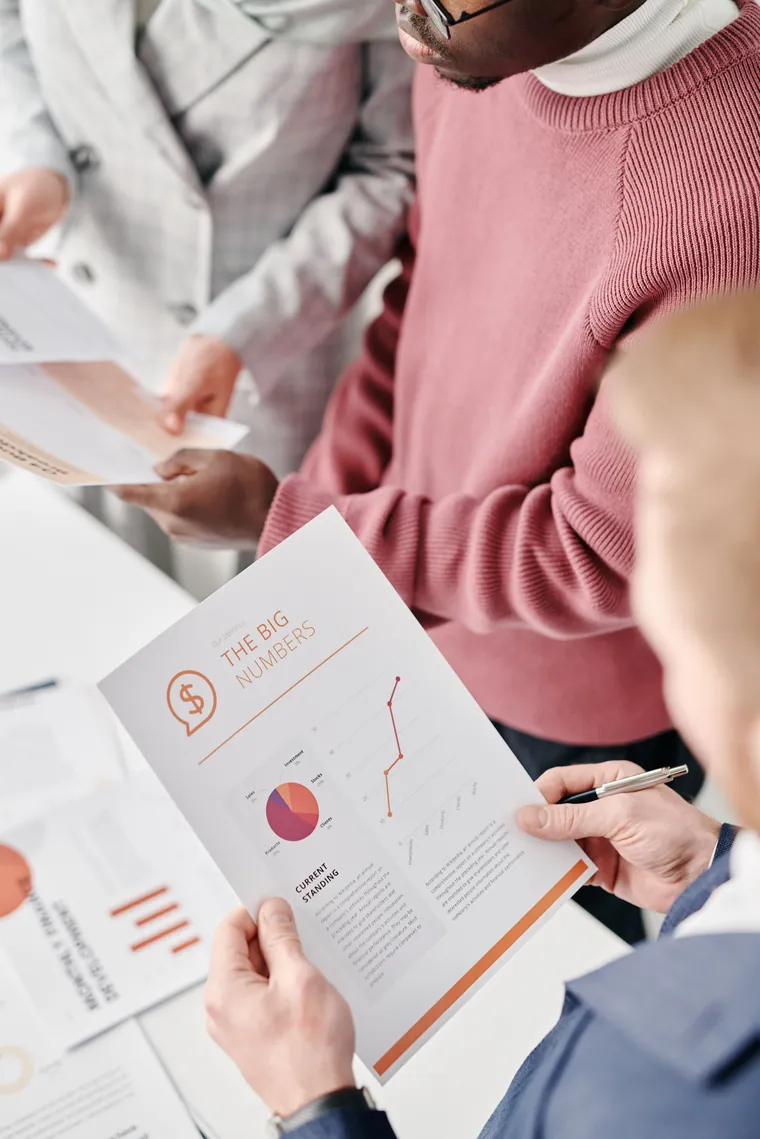 Travel technology buyers reviewing performance data